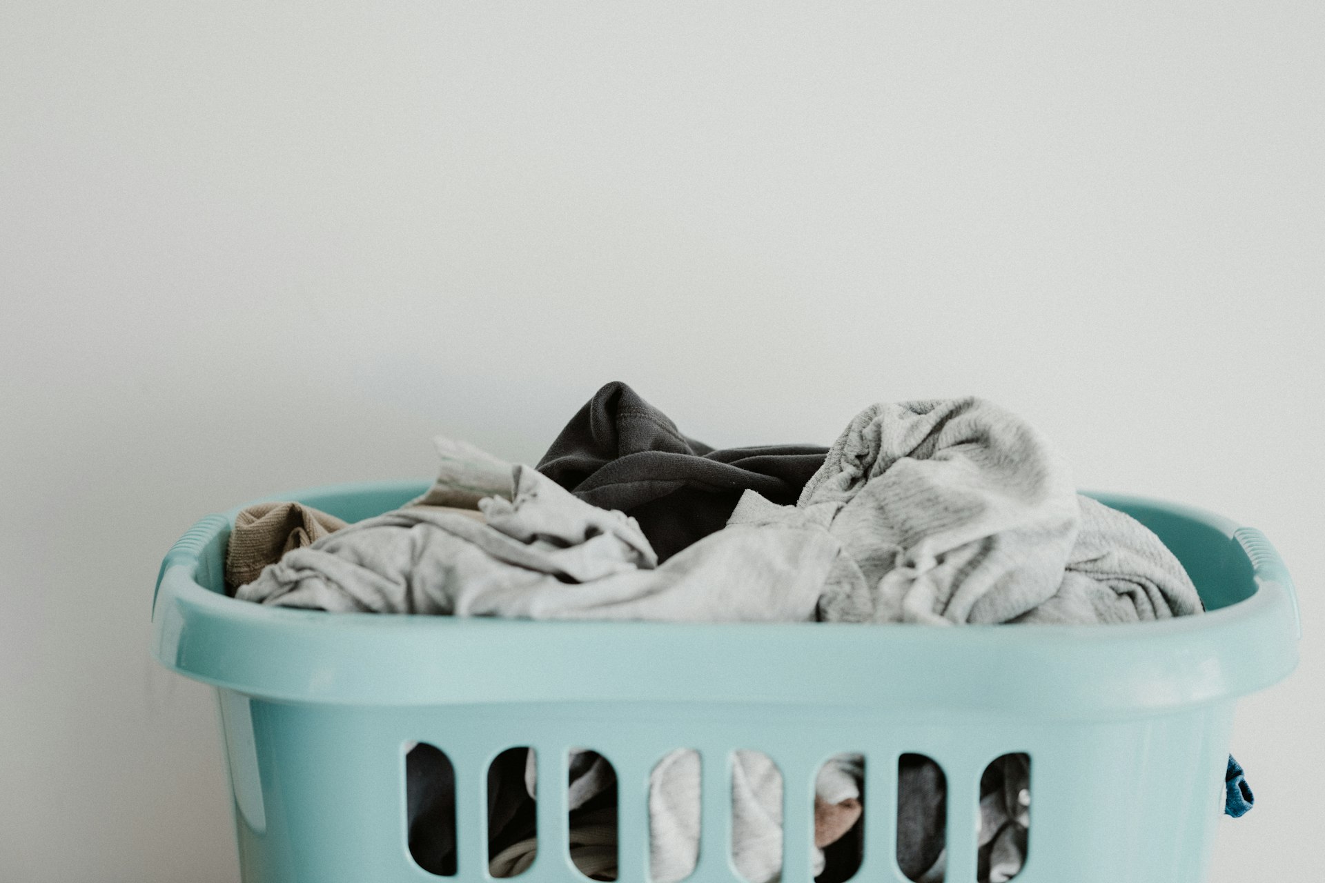 Freshly folded laundry prepared by Sylvia Grey